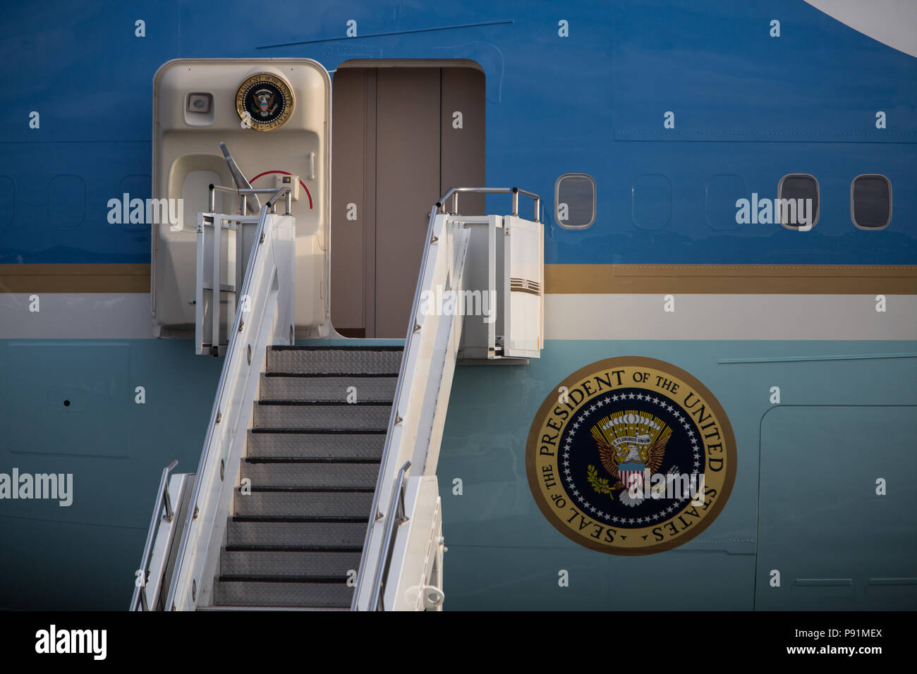 Prestwick, Scotland, on 13 July 2018. President Donald Trump, and wife Melania, arrive on Air Force One at Glasgow Prestwick International Airport at the start of a two day trip to Scotland. Image Credit: Jeremy Sutton-Hibbert/ Alamy News. Stock Photo