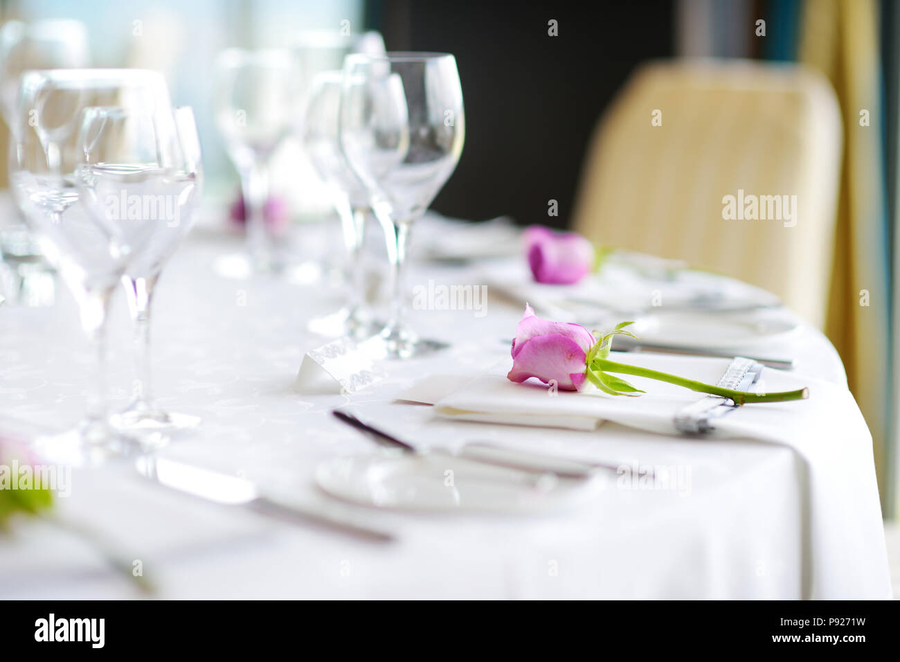 Beautiful table setting with crockery and flowers for a party, wedding reception or other