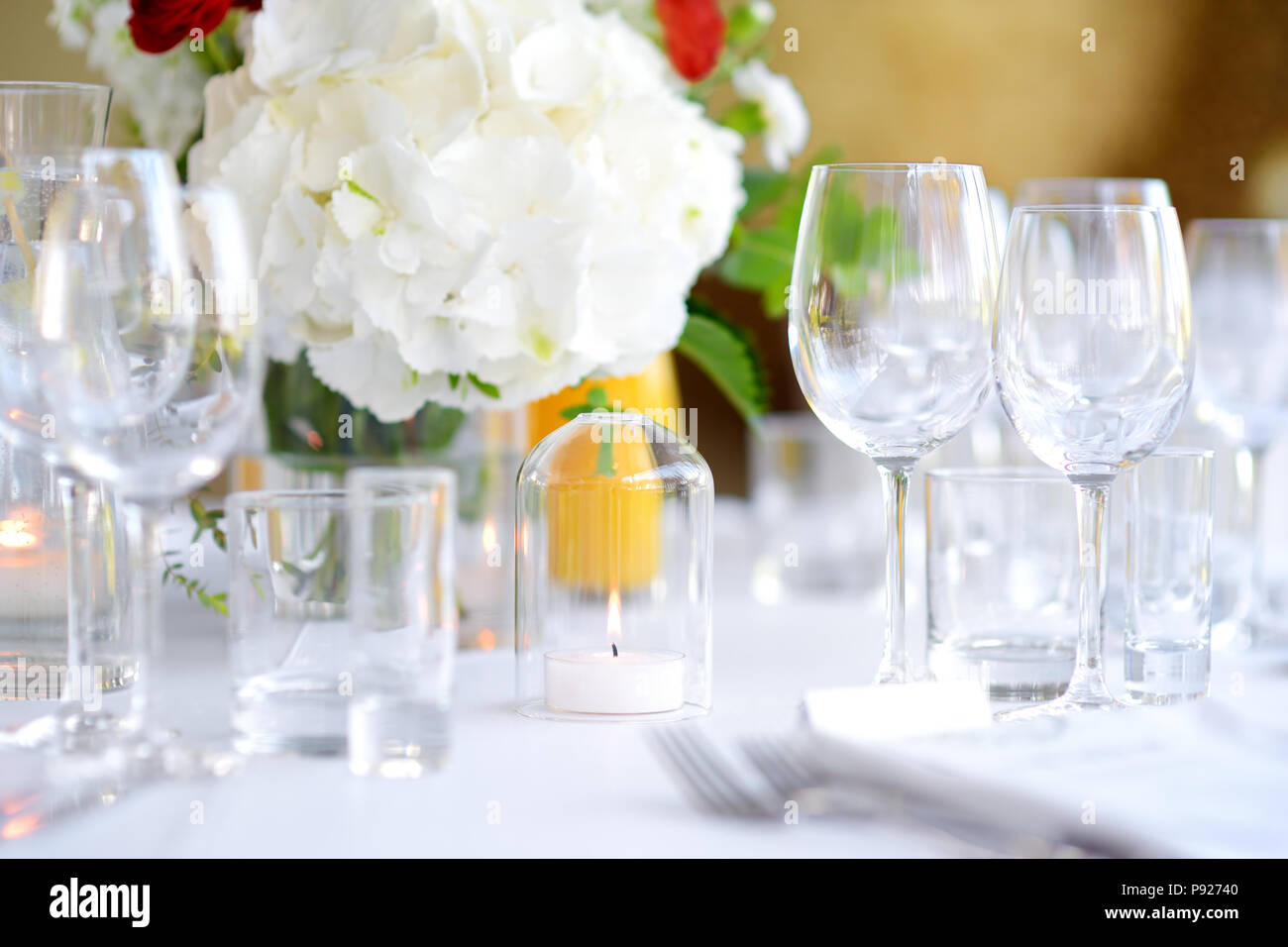 Beautiful table setting with crockery and flowers for a party, wedding reception or other