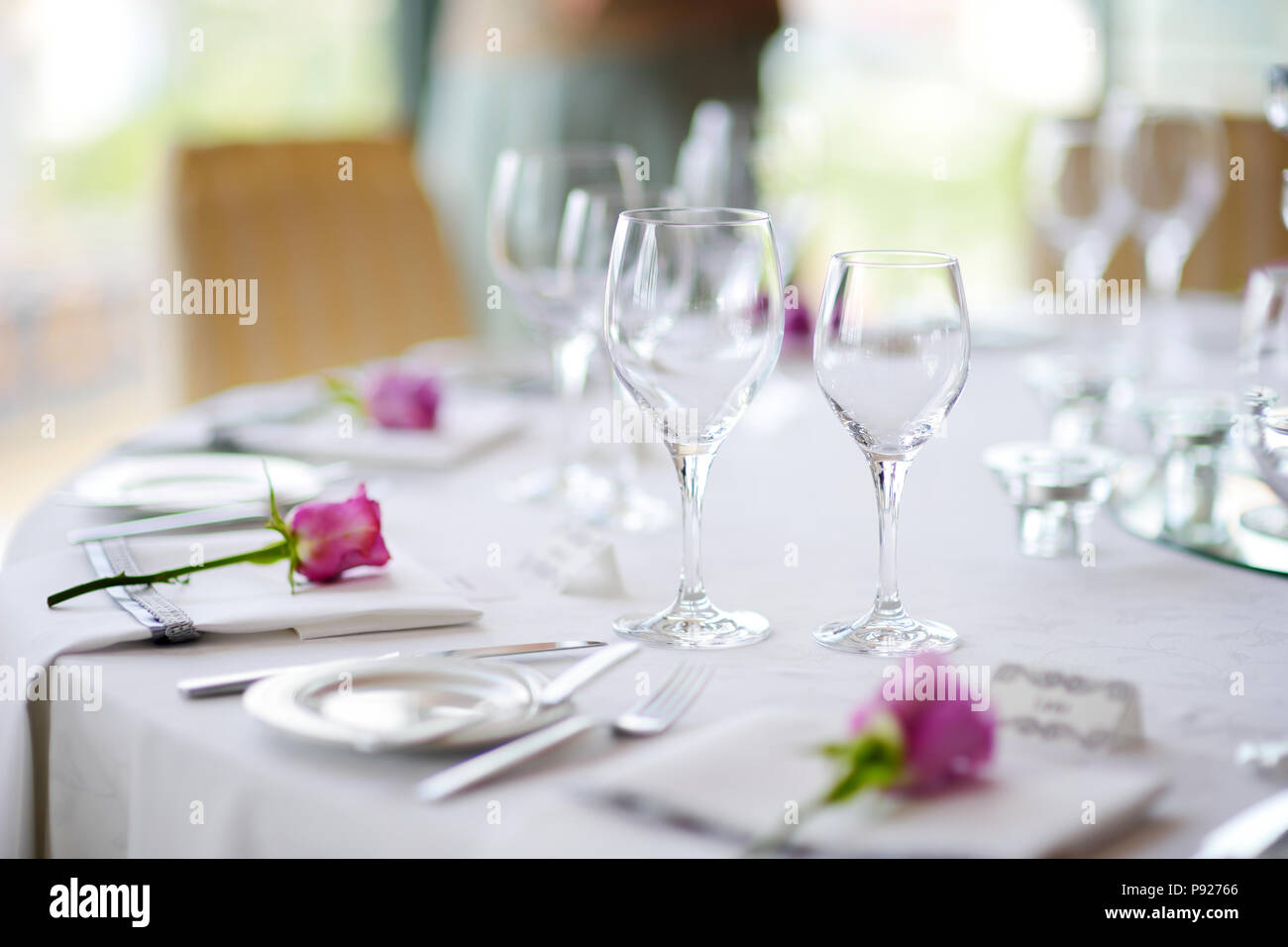 Beautiful table setting with crockery and flowers for a party, wedding
