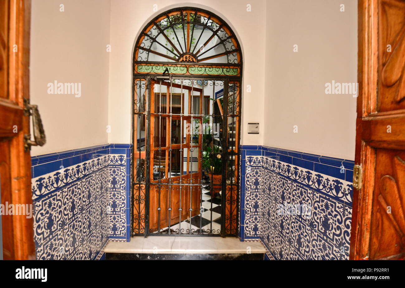 Traditional house entry with ceramics. Barrio San Bartolome, Seville, Spain (Sevilla - España) Stock Photo