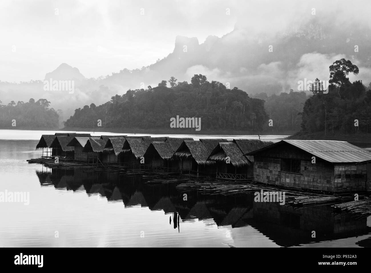 Dawn as seen from CHIEW LAN RAFT HOUSE on CHEOW EN LAKE in the KHAO SOK NATIONAL PARK - THAILAND Stock Photo