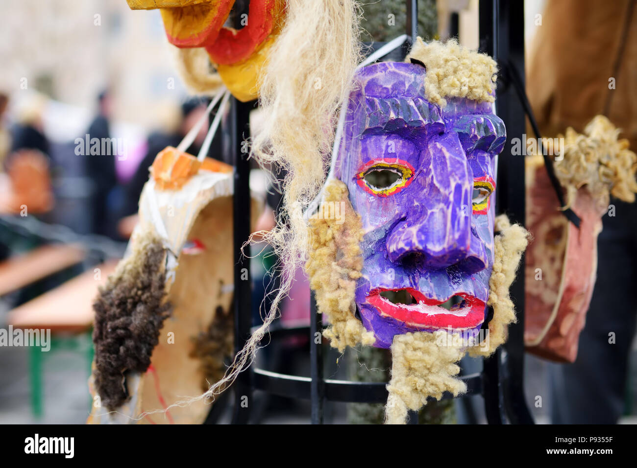 Wooden maks weared to celebrate Uzgavenes, a Lithuanian annual folk festival taking place seven weeks before Easter. Stock Photo