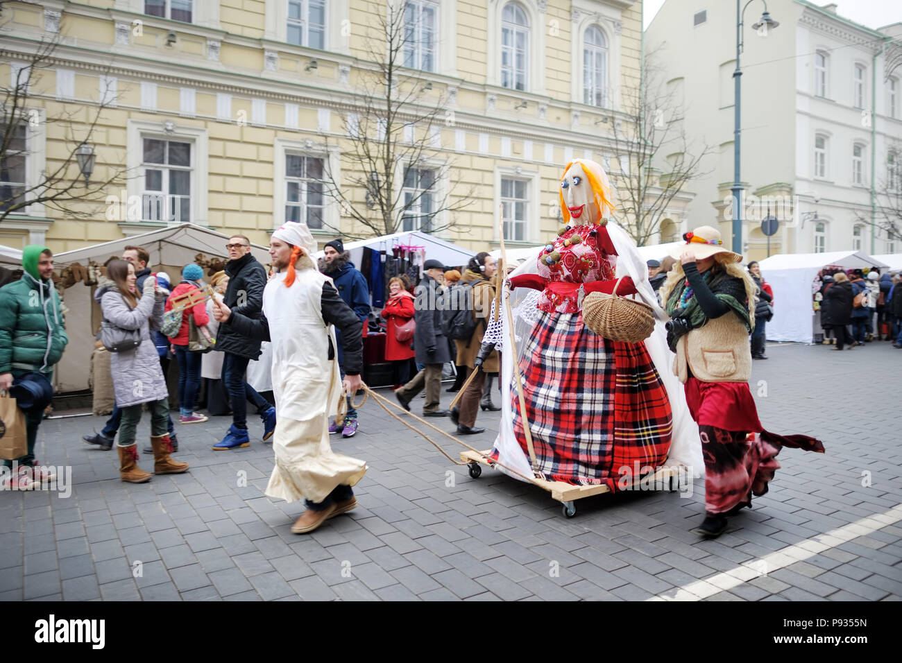 VILNIUS, LITHUANIA - FEBRUARY 25, 2017: Hundreds of people celebrating Uzgavenes, a Lithuanian annual folk festival taking place before Easter. Partic Stock Photo