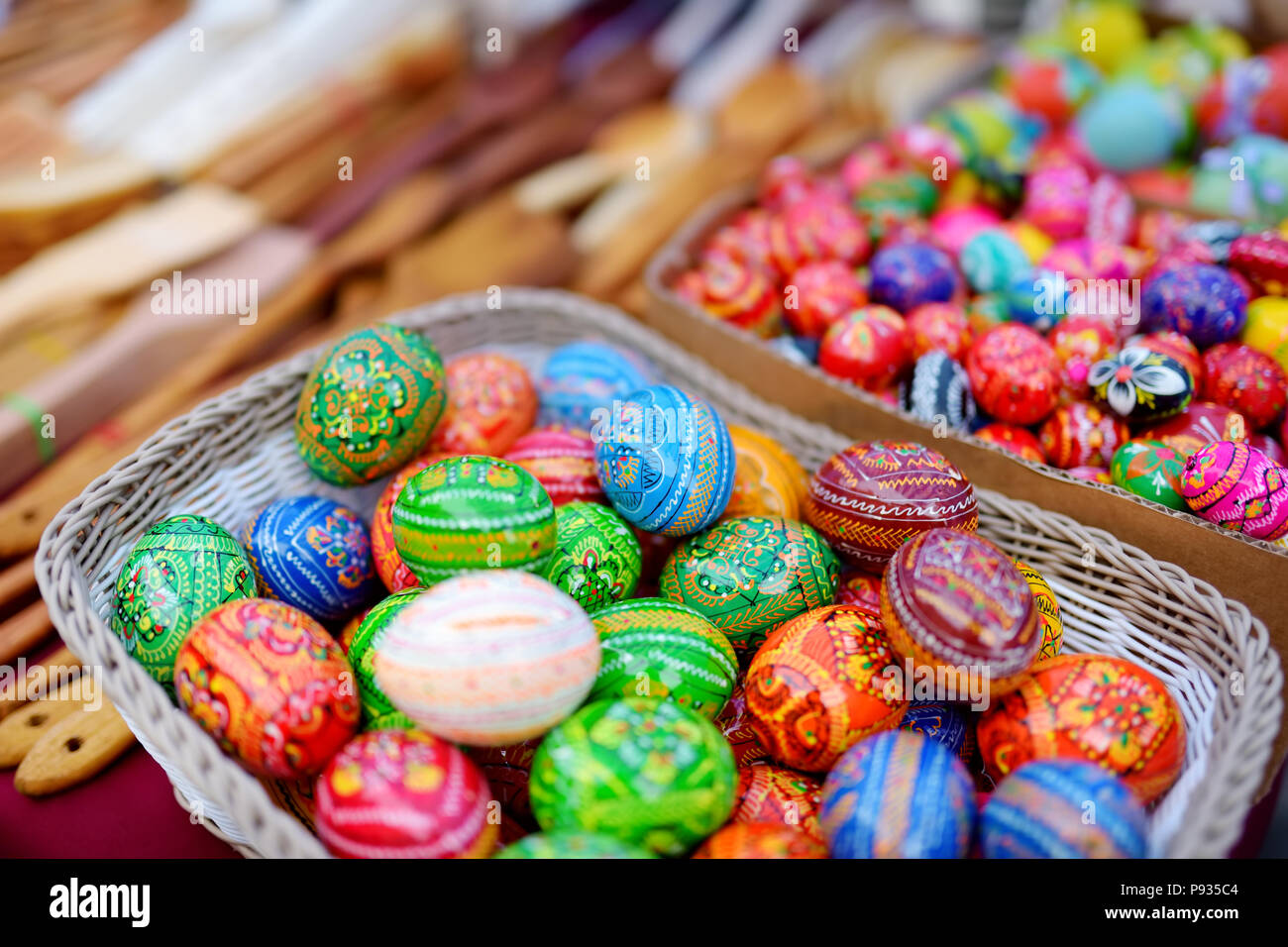 Colorful handmade wooden Easter eggs sold in annual traditional crafts