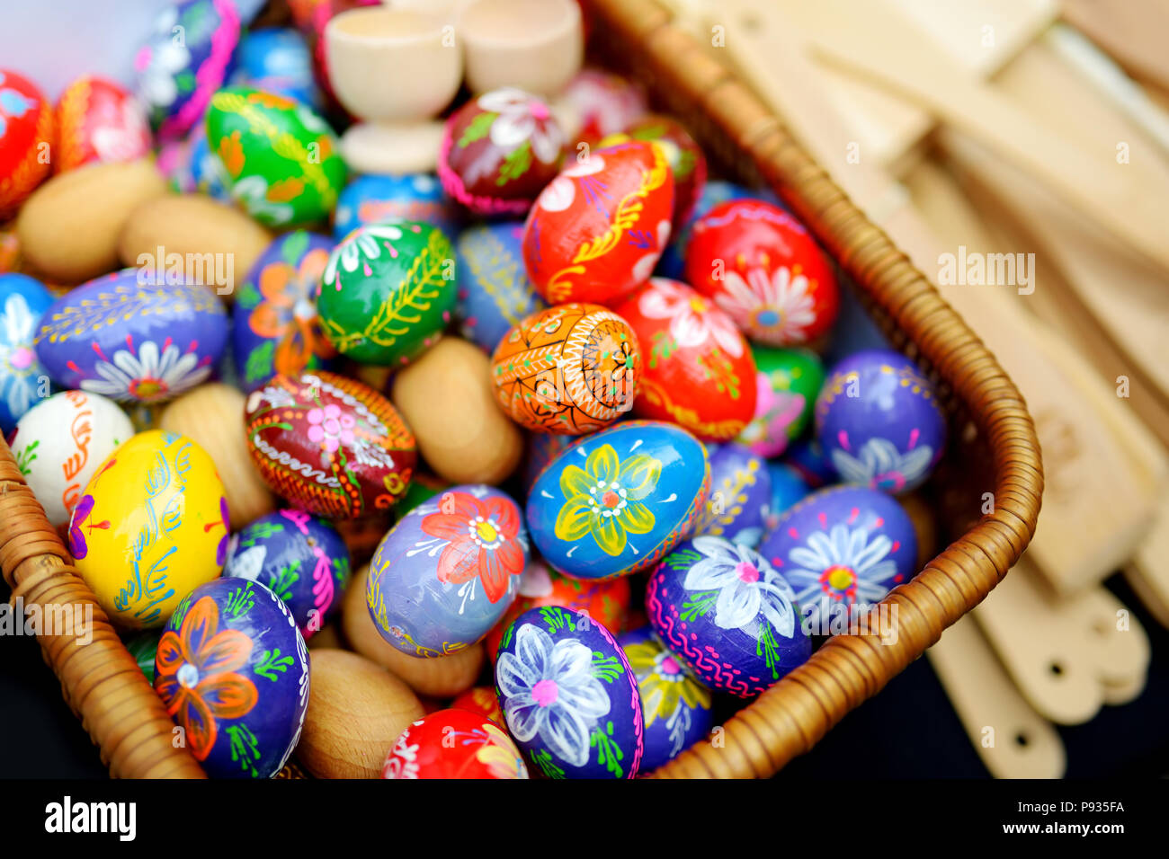 Colorful handmade wooden Easter eggs sold in annual traditional crafts