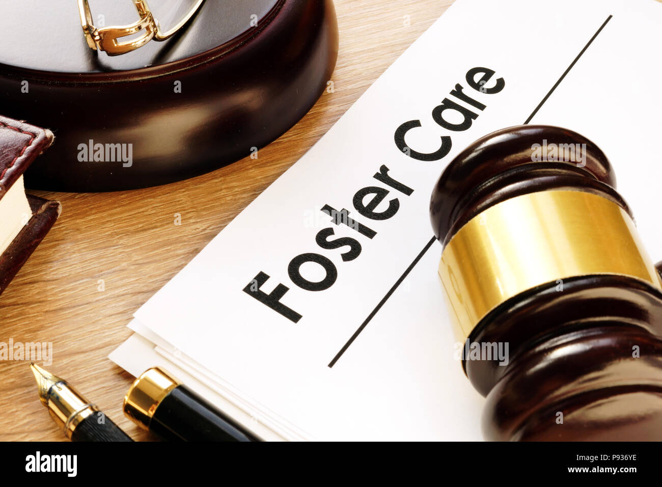 Foster care. Documents and gavel on a desk Stock Photo Alamy