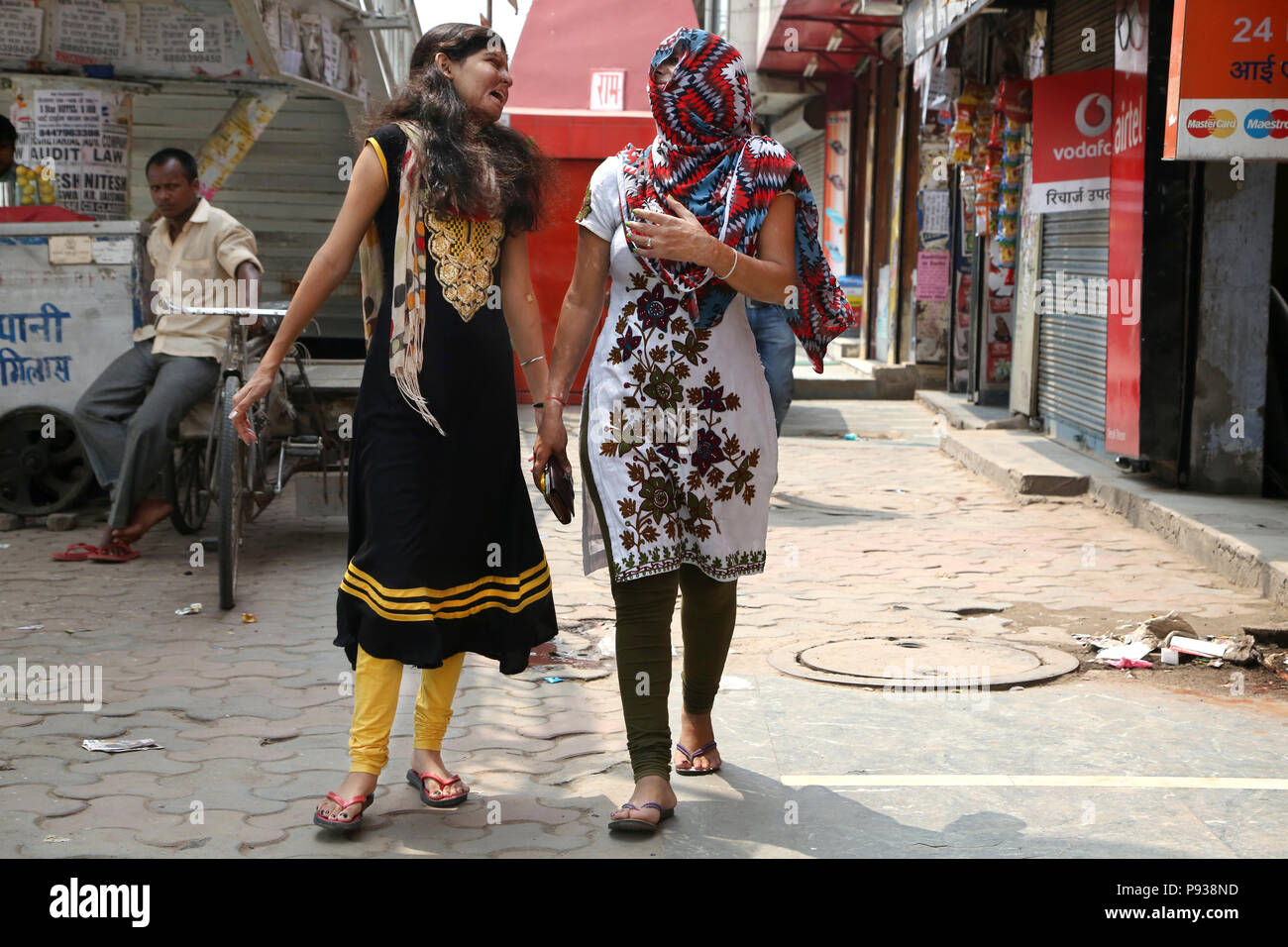 Ritu and Soniya, victims of Acid attack in a street of Delhi (from Stop Acid Attacks campaign, India) Stock Photo
