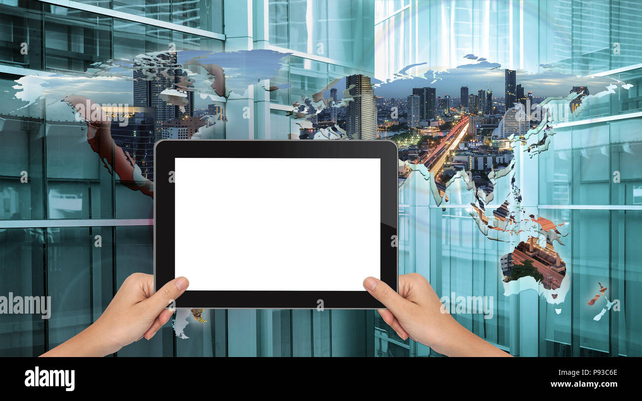 Hand shows black tablet in horizontal position on technology background - mockup template Stock Photo