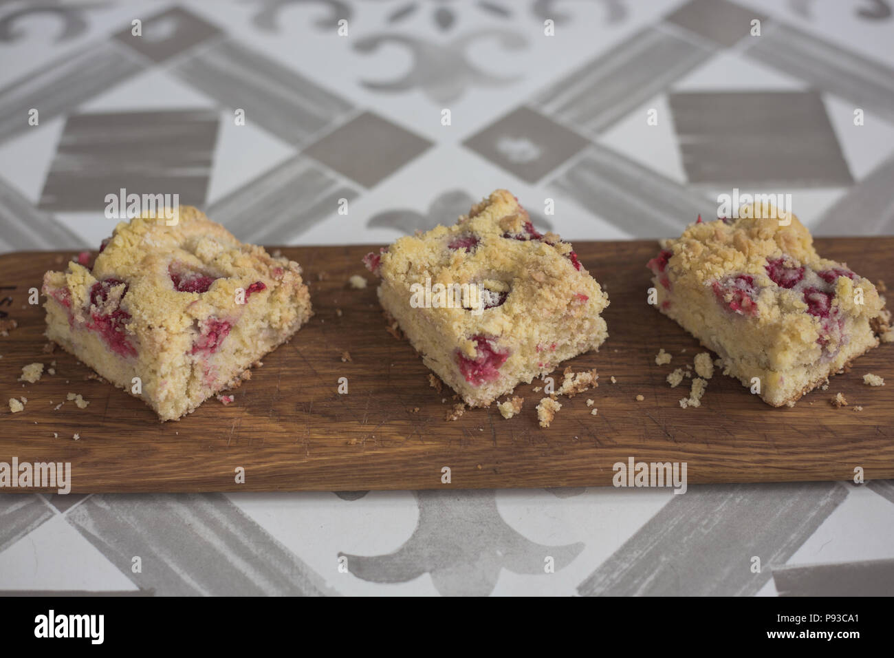 Raspberry and white chocolate crumble tray bake Stock Photo