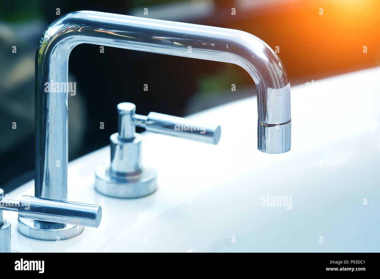 high spout faucet in front on sink Stock Photo - Alamy