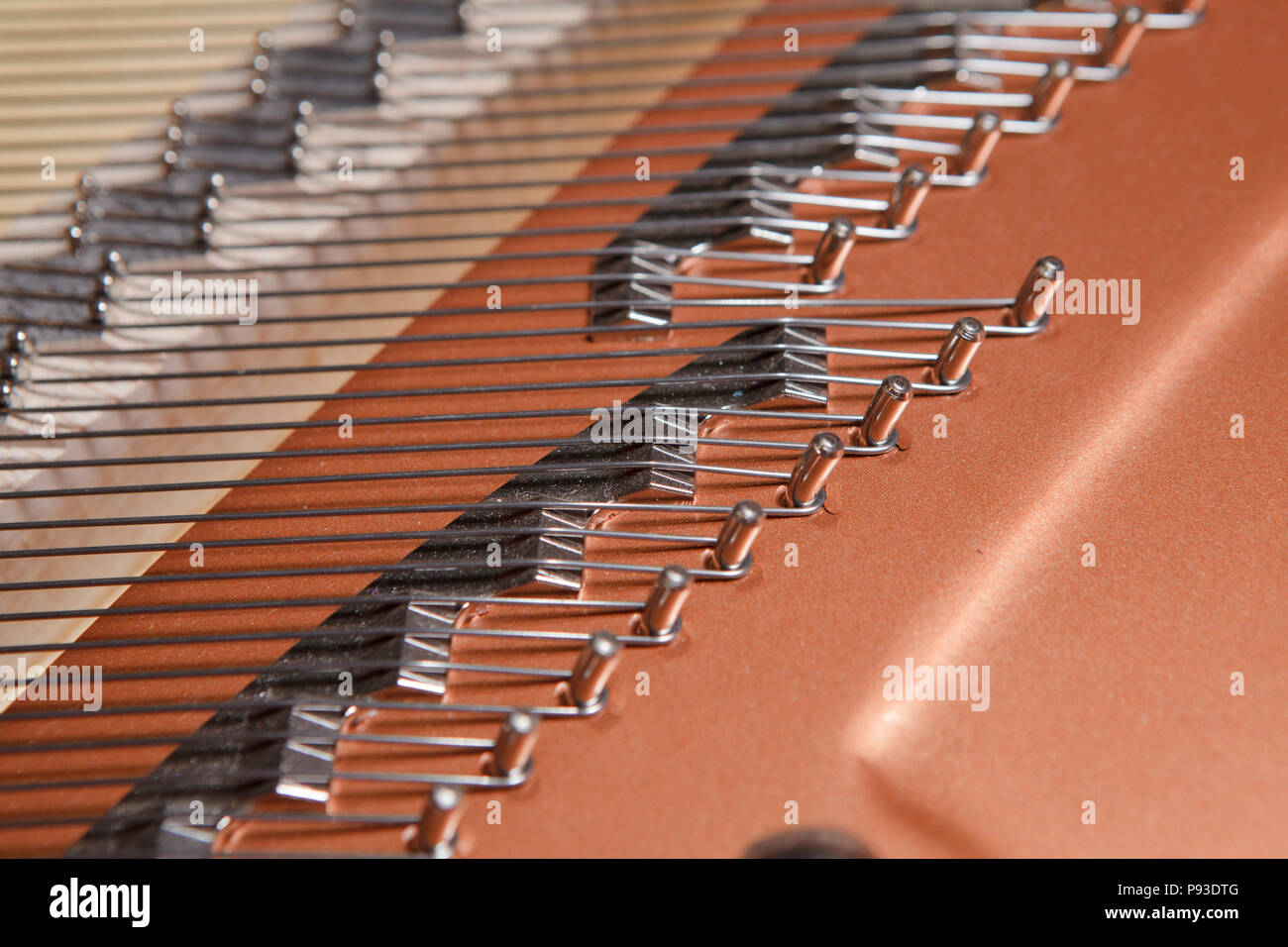high tones strings inside piano, close up Stock Photo