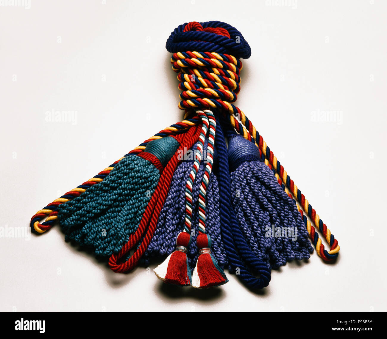 Close-up of blue and red silk tasselled tie-backs Stock Photo