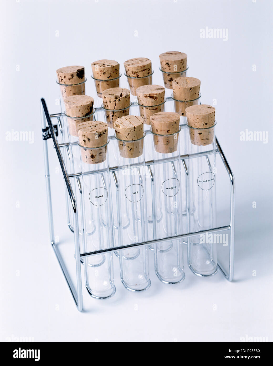 Closeup of glass vials with cork stoppers in stainlesssteel storage
