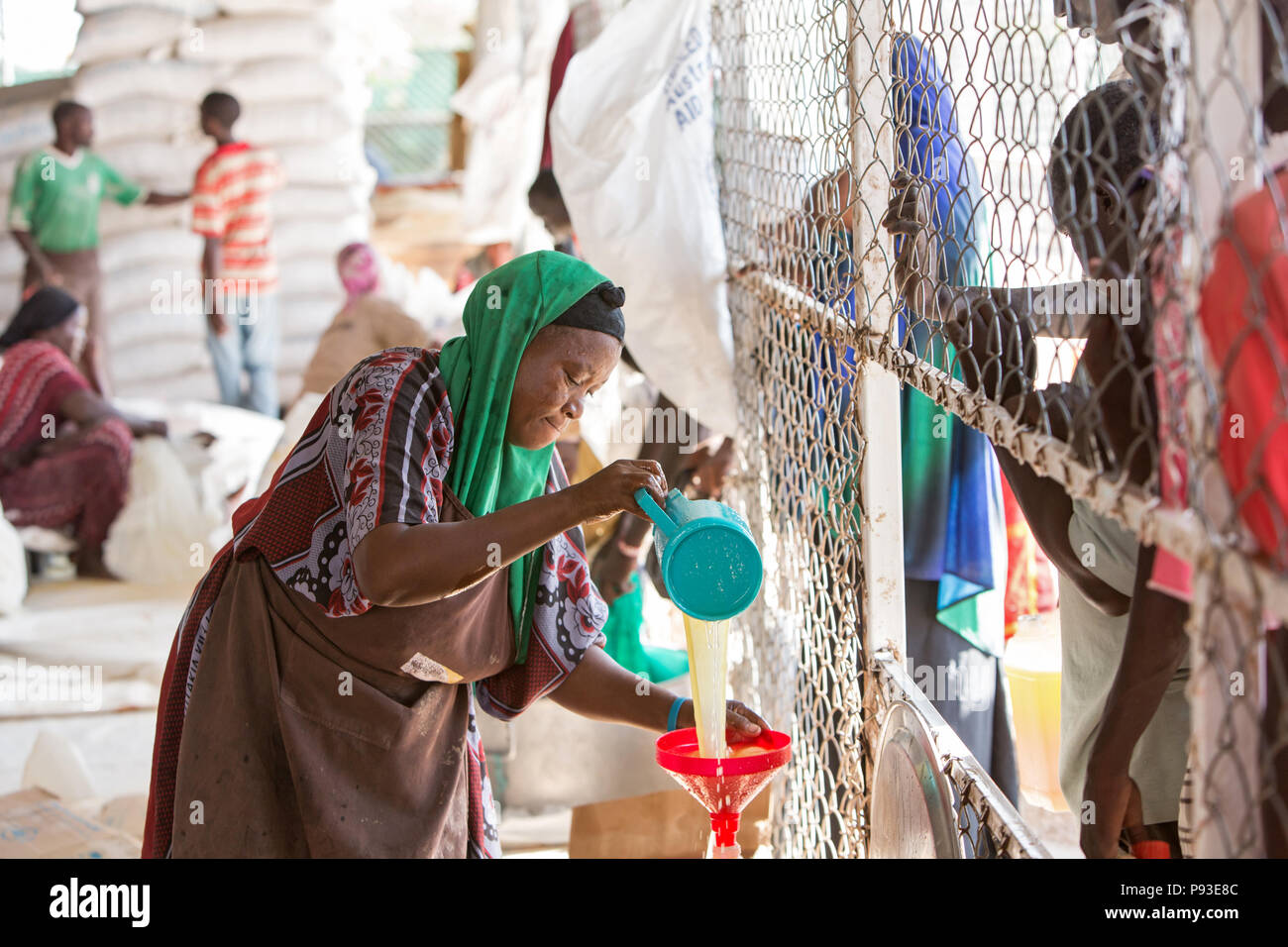 Kakuma, Kenya - Food distribution by the humanitarian aid organization World Food Program in a secure warehouse in the Kakuma refugee camp. Stock Photo