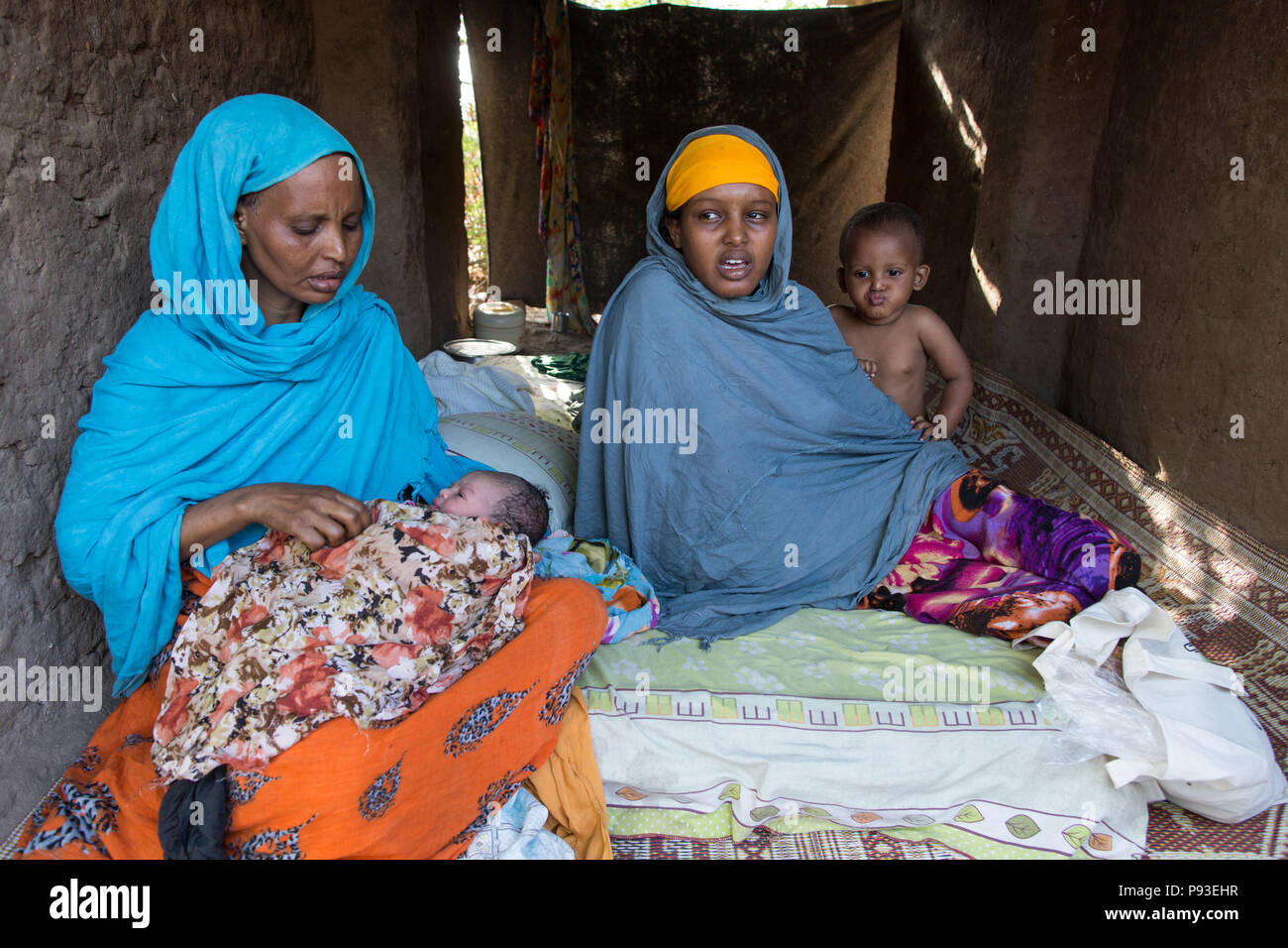 Kakuma, Kenya - Young refugee family with baby in refugee camp Kakuma. Stock Photo