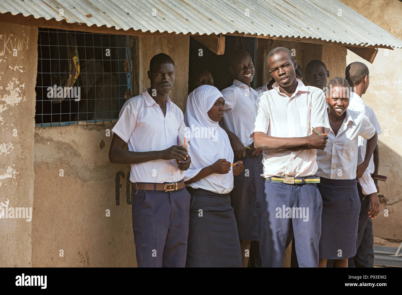 Kakuma, Kenya - Students stand in front of a school building in the Kakuma refugee camp. Stock Photo