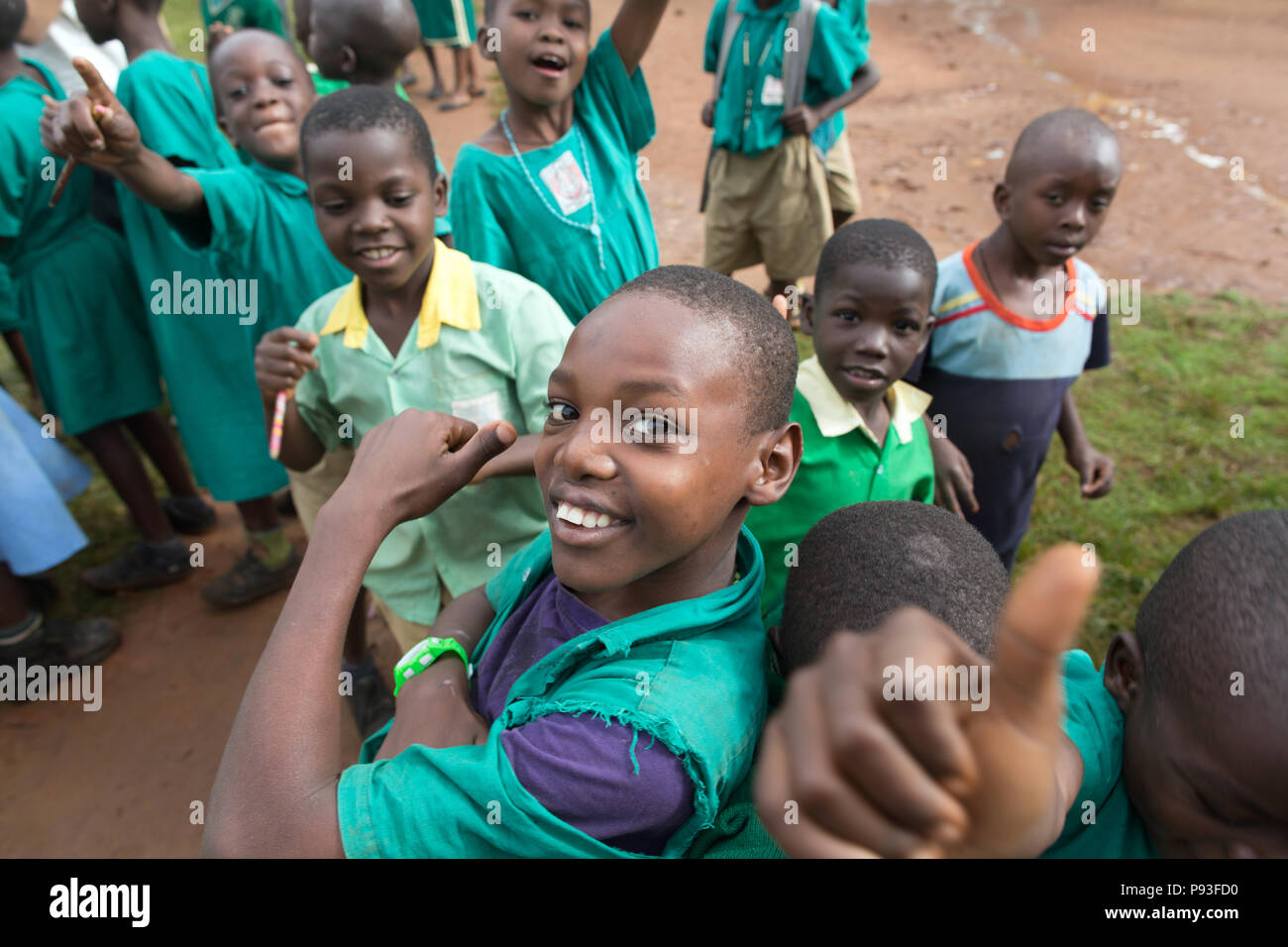 Bombo, Uganda - Elementary school-school students smirk at the schoolyard of St. Joseph's Bombo mixed primary school. Stock Photo