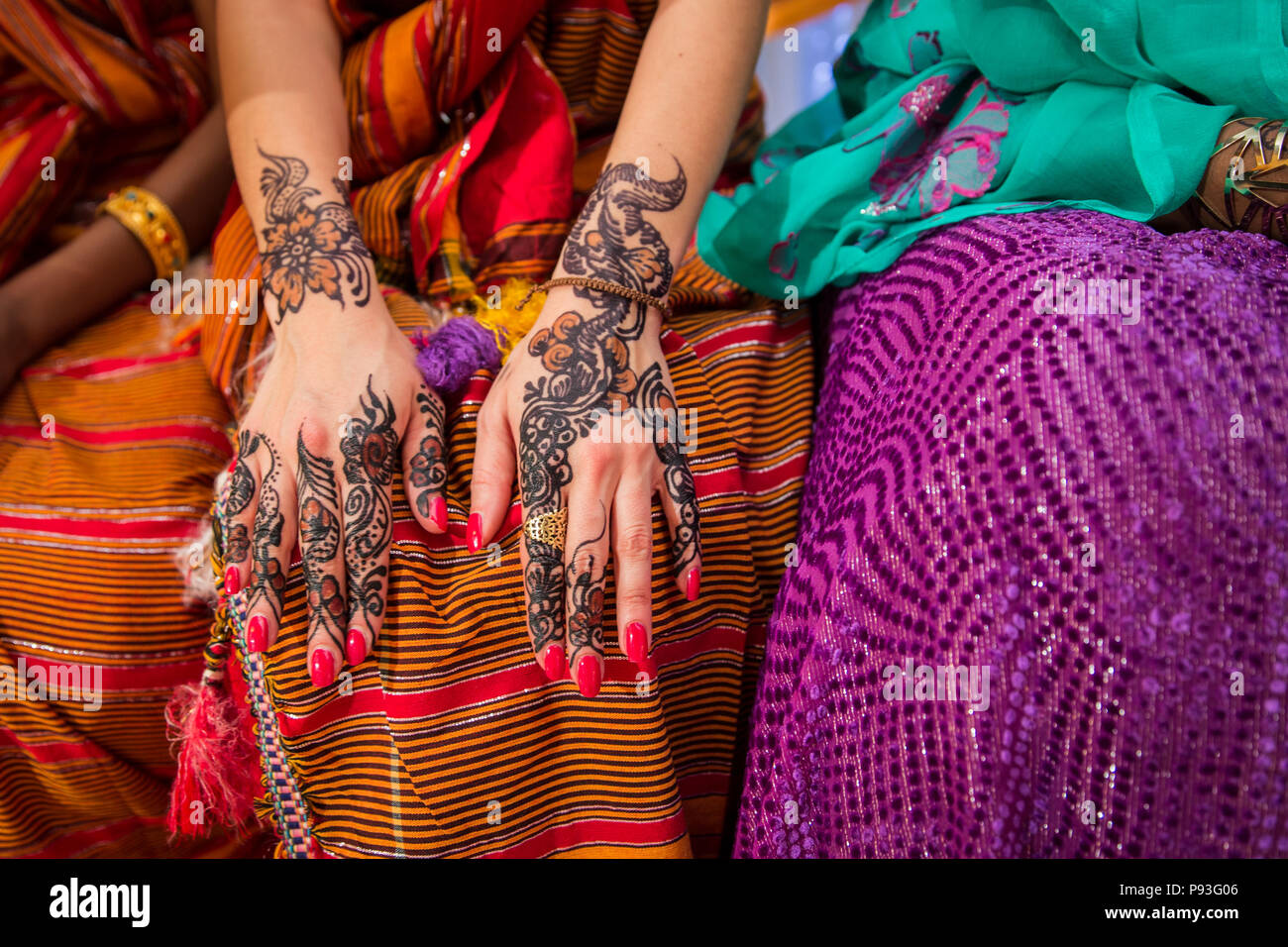 Black and Brown Henna Hands Drawings on Women for African Wedding Ceremony Stock Photo
