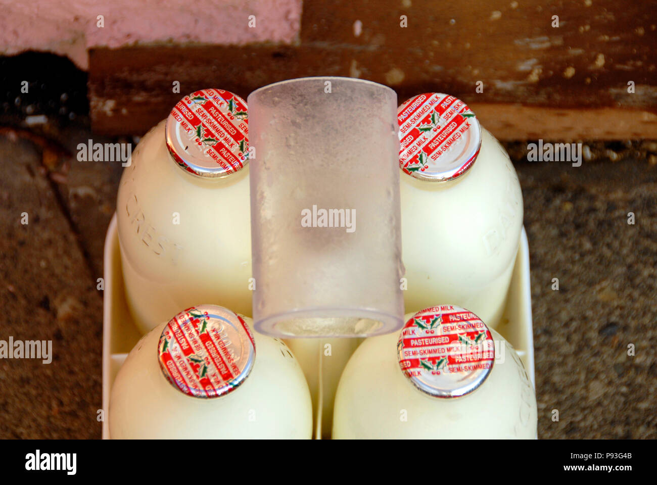 https://c8.alamy.com/comp/P93G4B/special-milk-bottle-tops-with-christmas-decoration-england-P93G4B.jpg