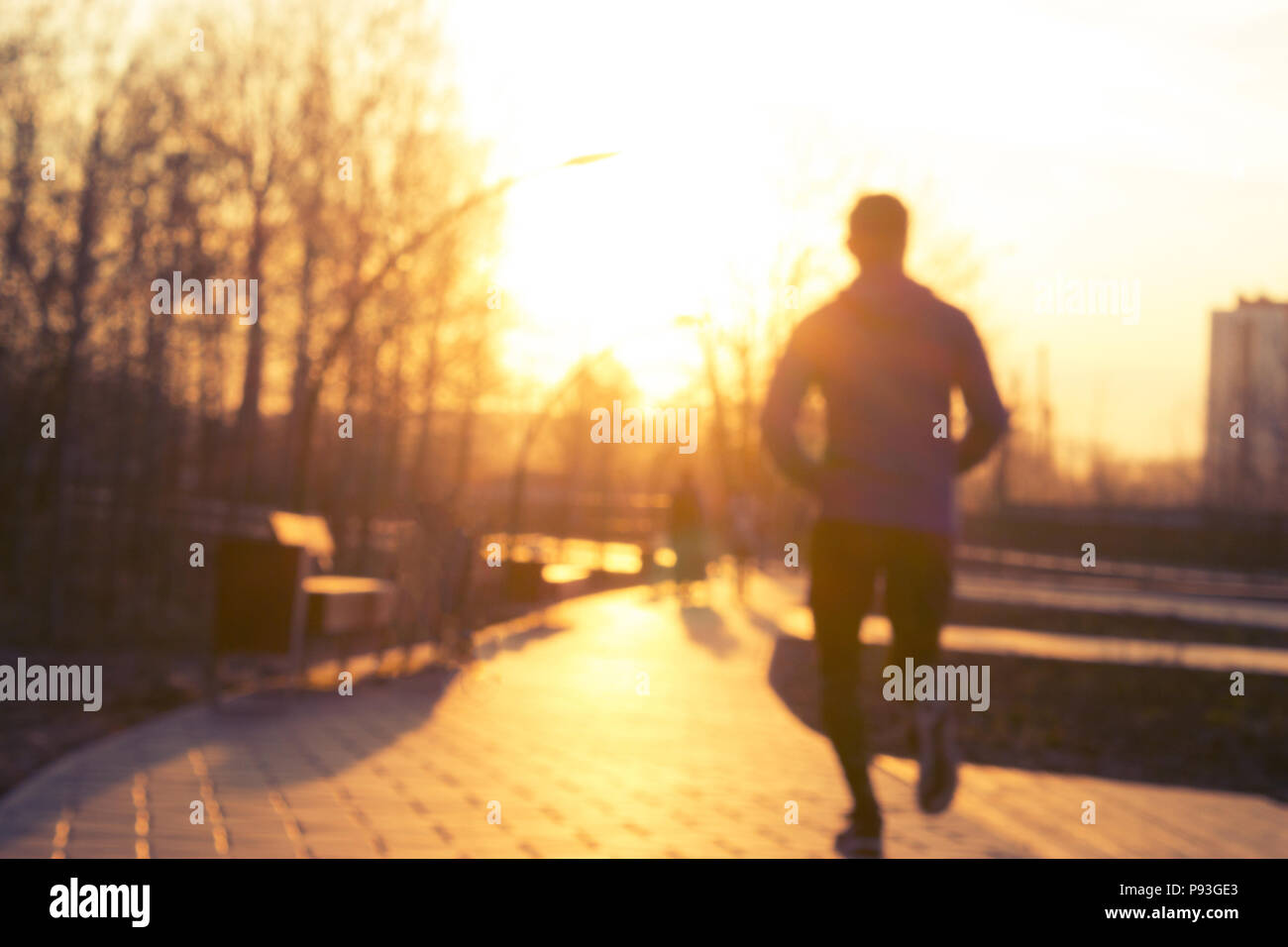 Young athletic man running palm hi-res stock photography and images - Alamy