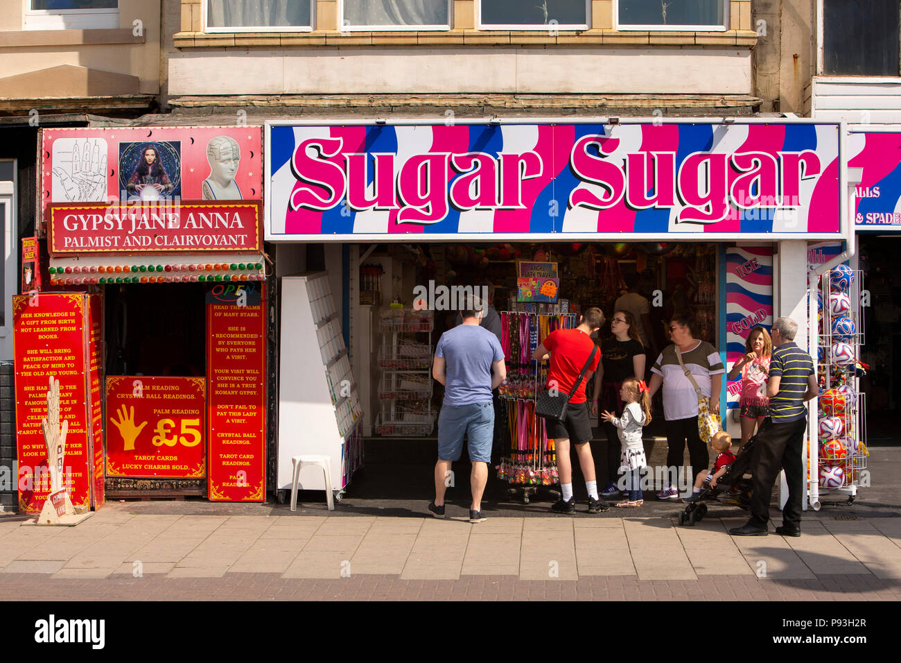 UK, England, Lancashire, Blackpool, Promenade, Palmist and Clairvoyant Gypsy Jane Anna next to Sugar Sugar sweet shop Stock Photo