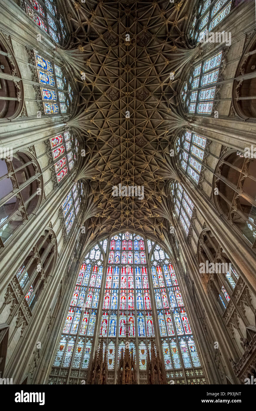 The vaulted ceiling and stained glass windows of Gloucester Cathedral