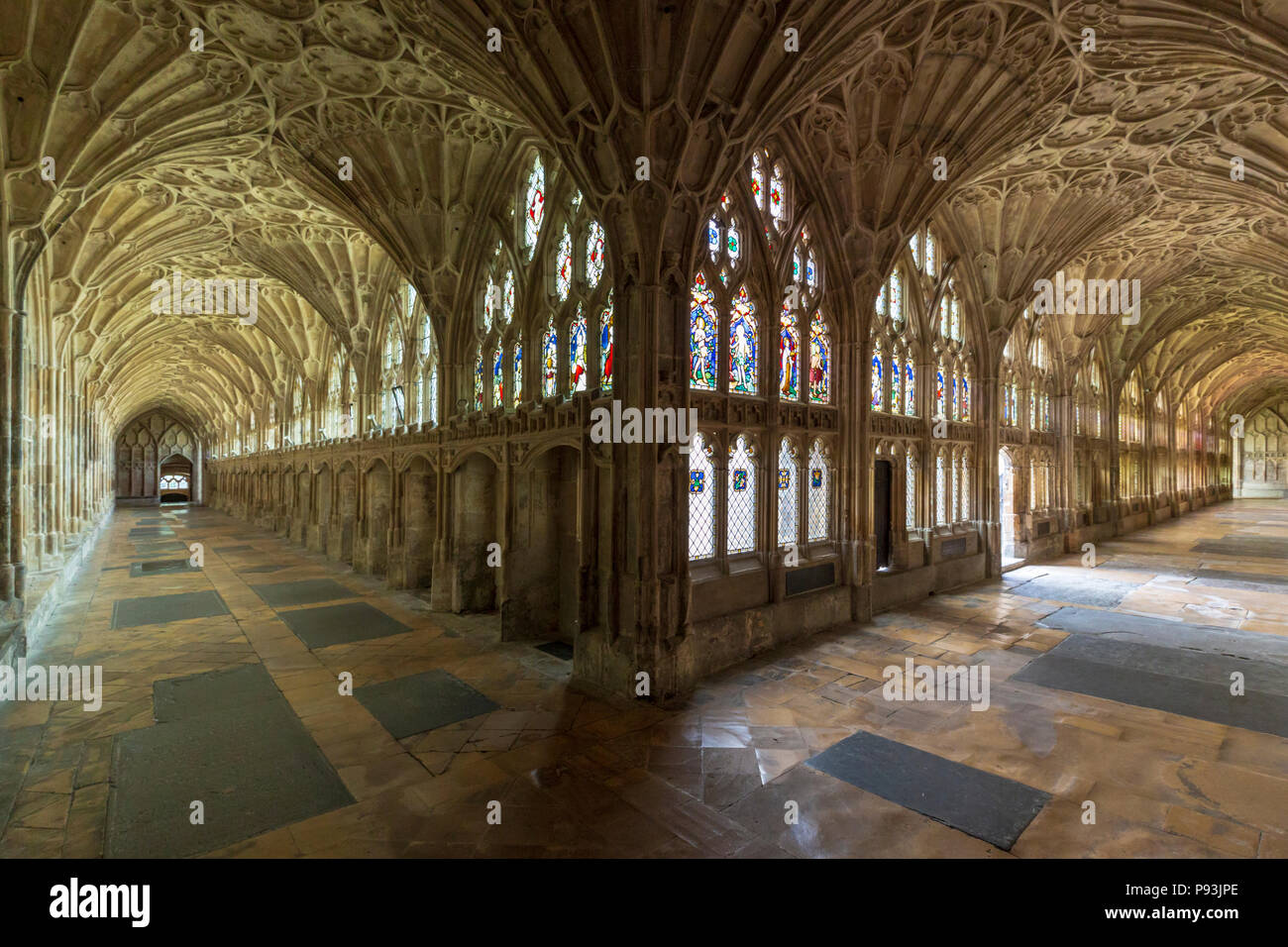 The vaulted ceiling and corridors of the Cloisters at Gloucester Cathedral, Gloucester, England Stock Photo