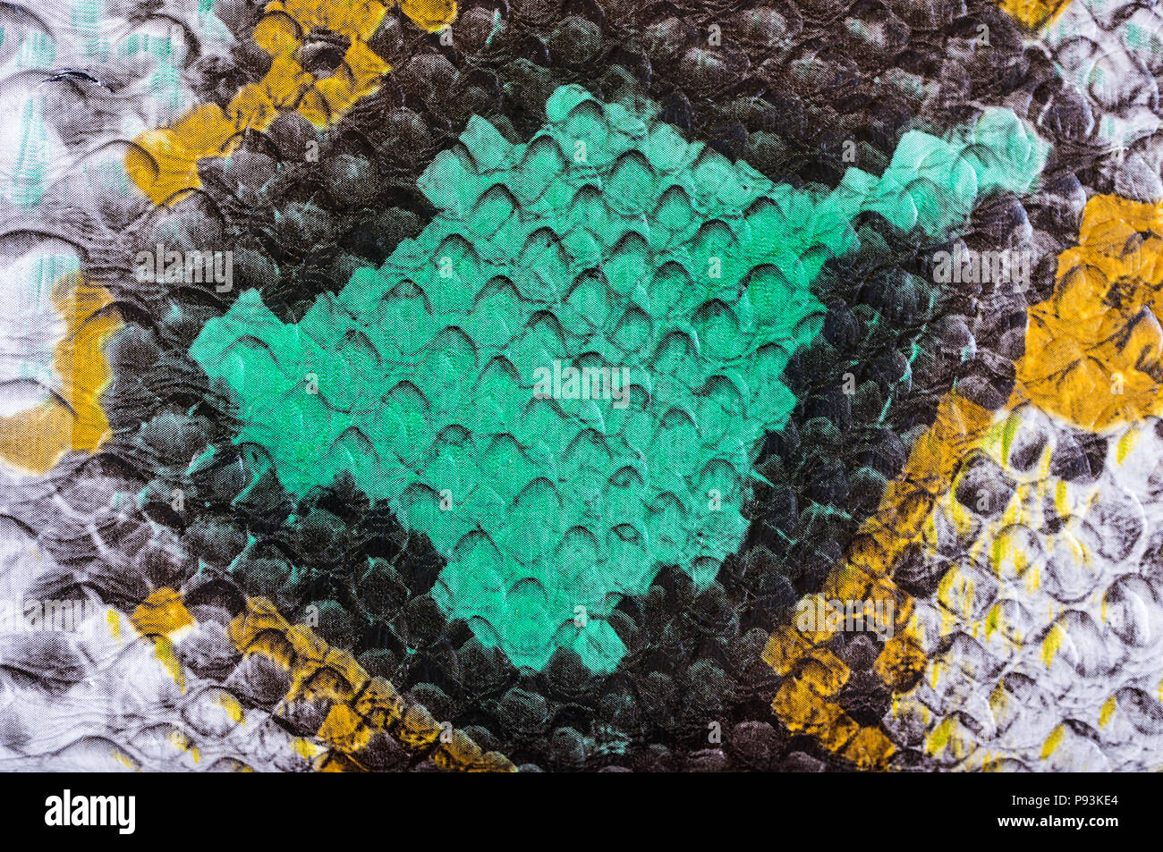 Multicolored faux leather snake Python texture for background. Close up ...