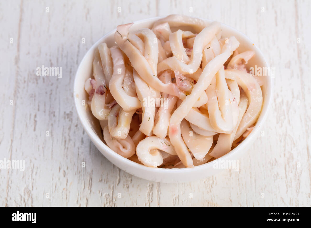 Delicious bowl of squid meat Stock Photo - Alamy
