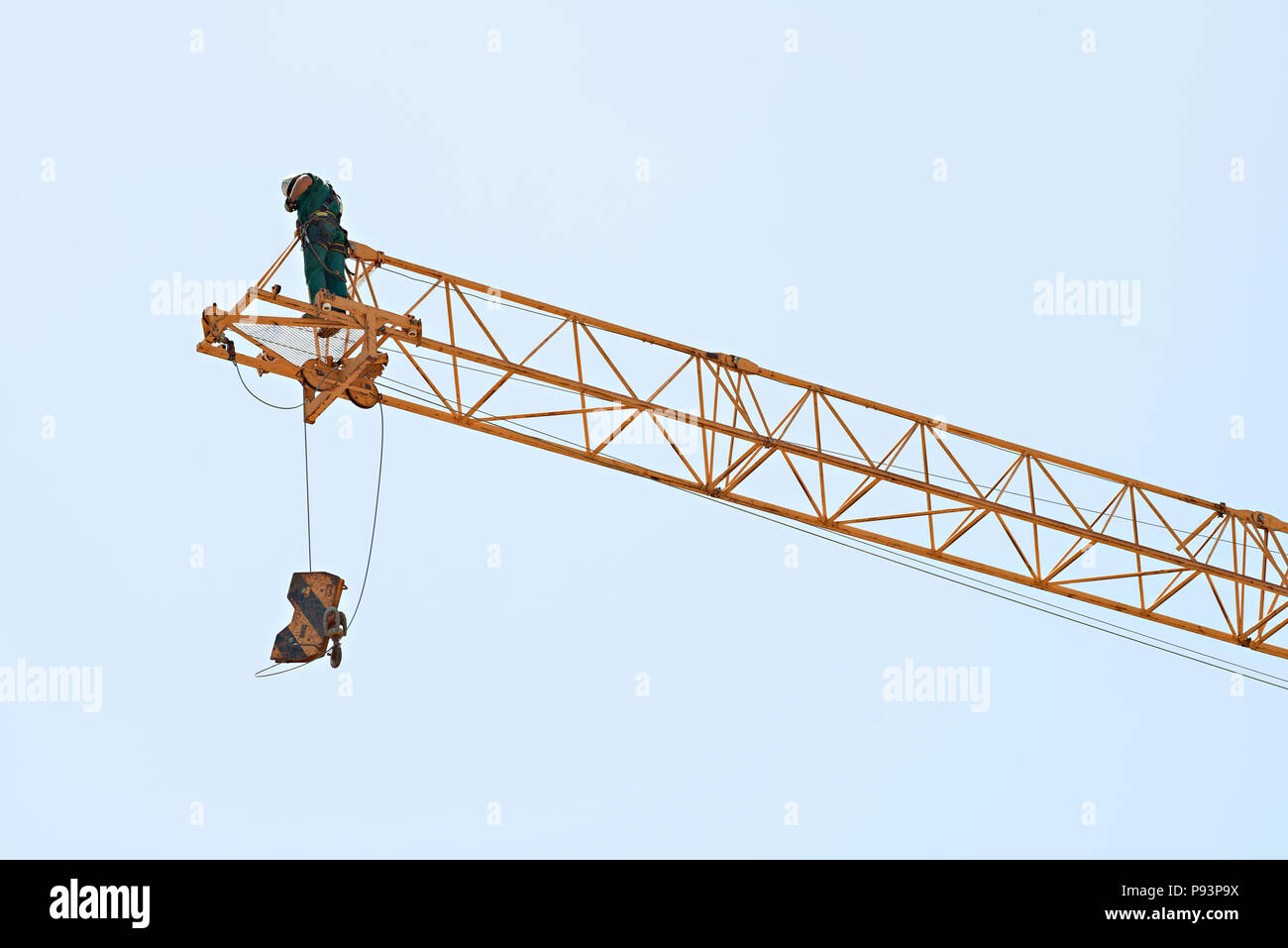 Tower Crane erector at work on end of jib Stock Photo Alamy
