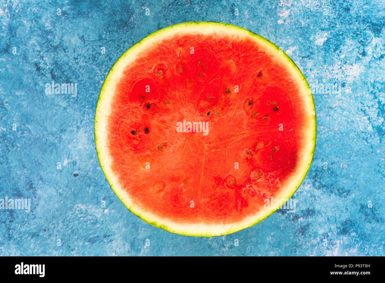 Watermelon cut in half - top view. Refreshing summer fruit Stock Photo ...