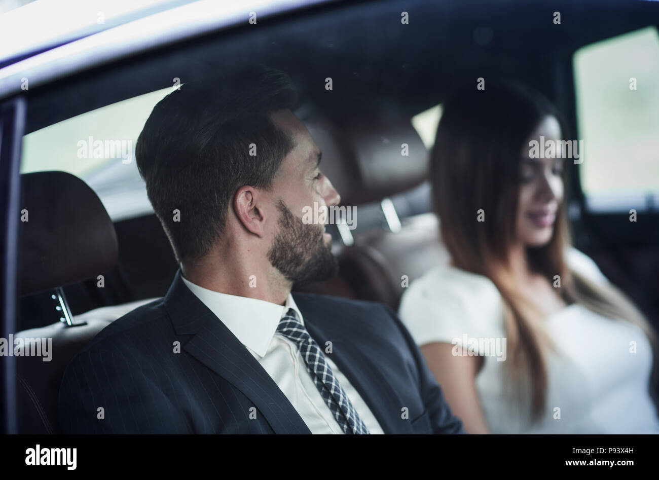 Young business team working together in the car Stock Photo