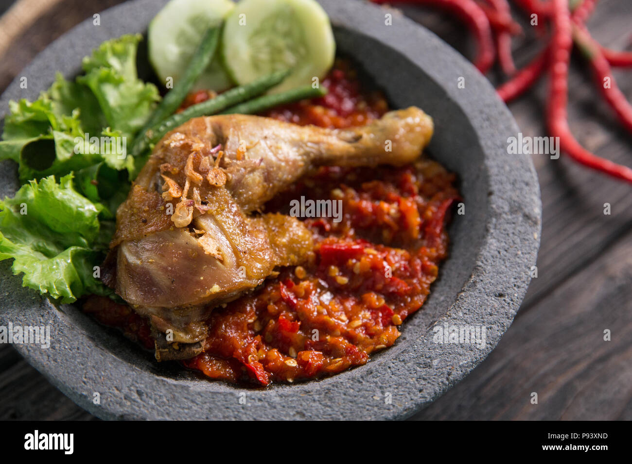 Close Up Of Ayam Penyet Traditional Spicy Sauce Or Sambal Fried Chicken Stock Photo Alamy