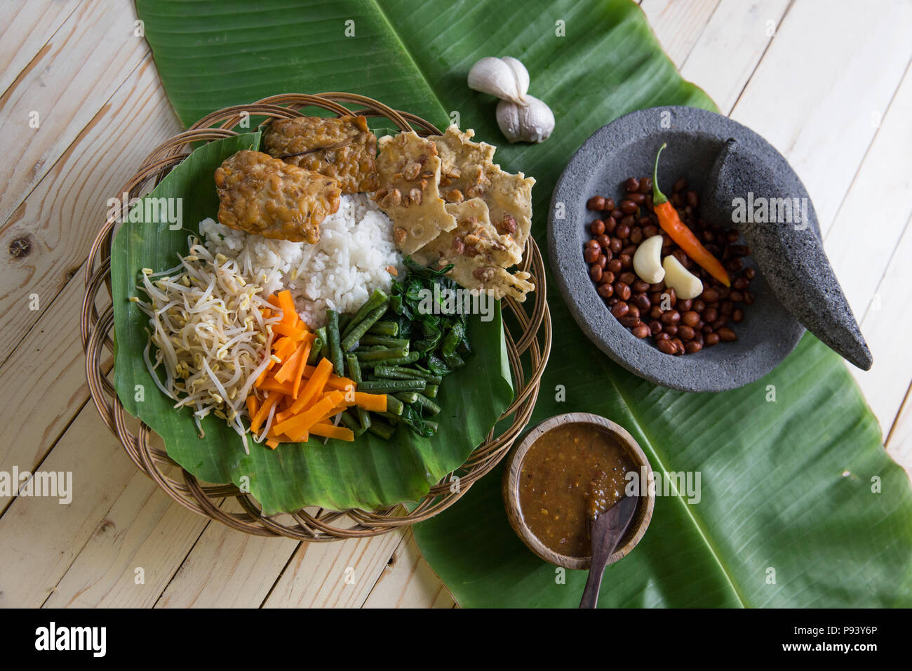 nasi pecel. vegetable with peanut sauce. indonesian tradtional ...