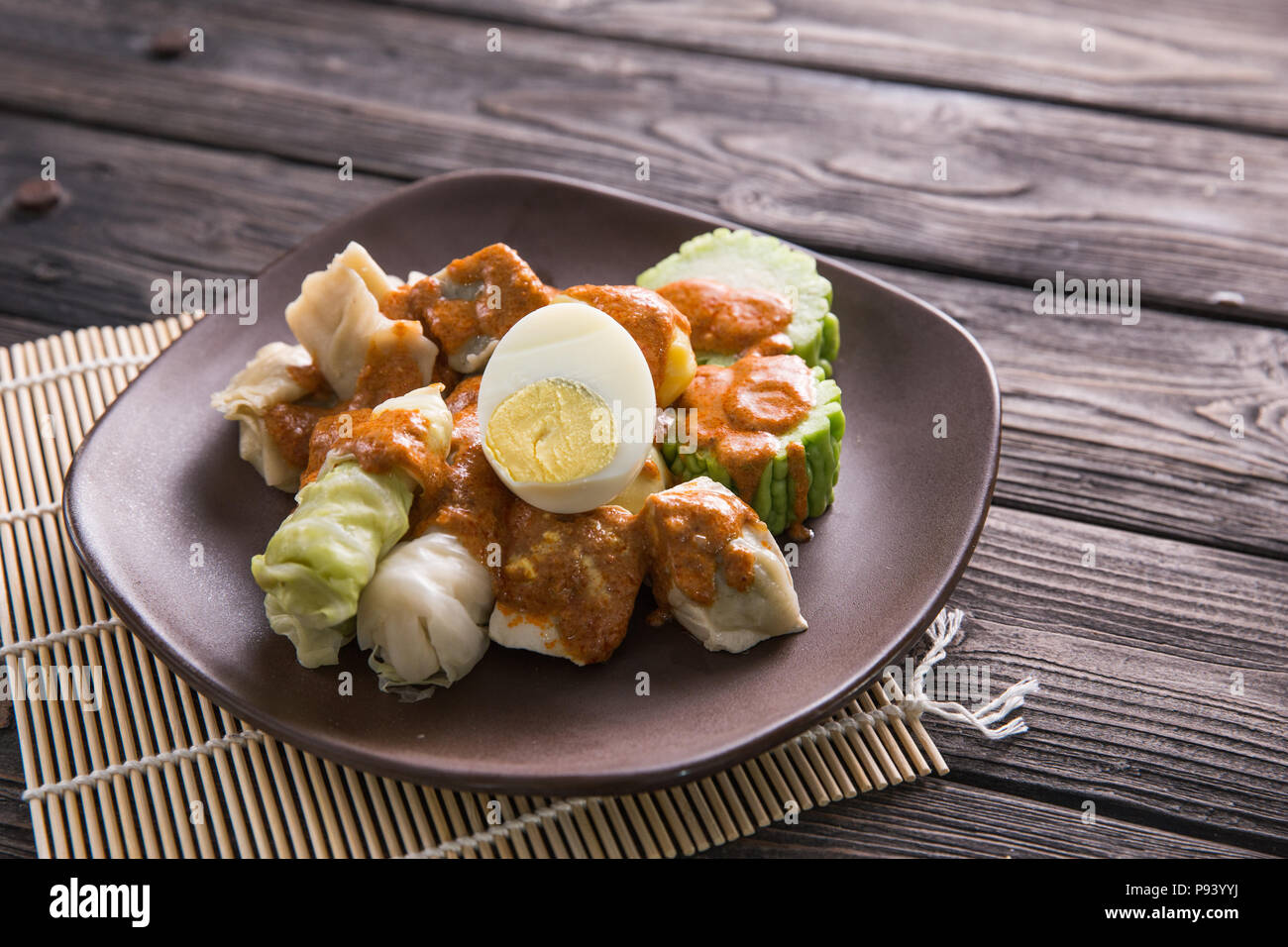 siomay. traditional indonesian food with peanut sauce. dumpling Stock