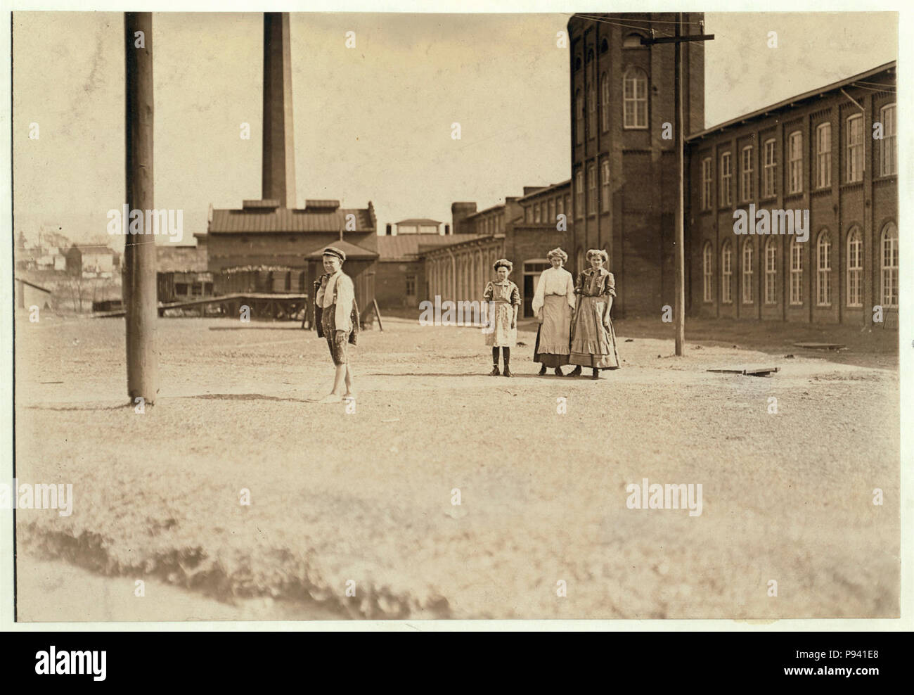 A few of the youngsters in the Manchester Cotton Mills, Macon, Ga. I was not allowed to go inside. See photos 517 to 520. Stock Photo