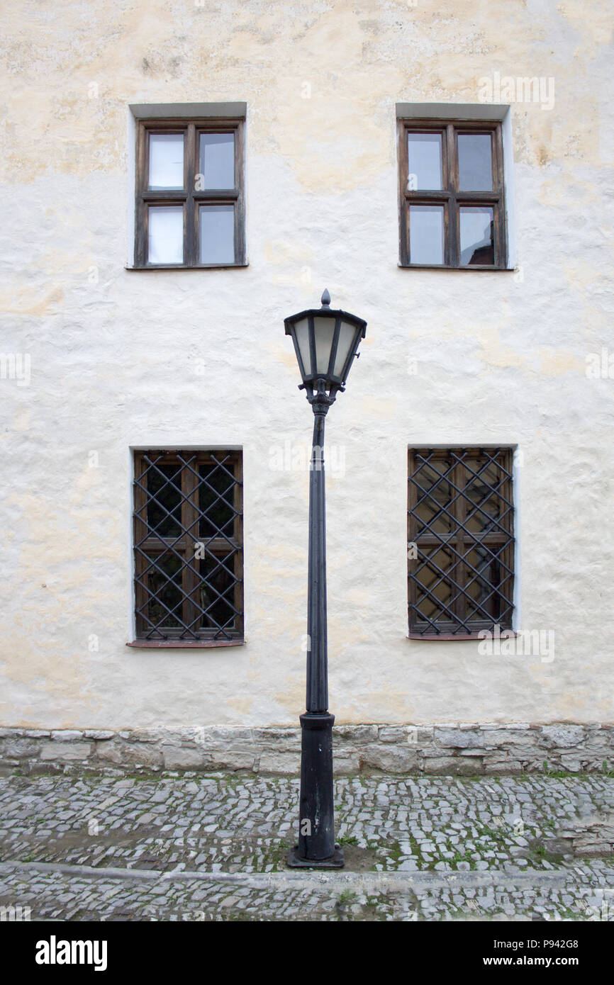 Photo of Vintage Old Street Classic Iron Lantern On The ancient building background. Stock Photo