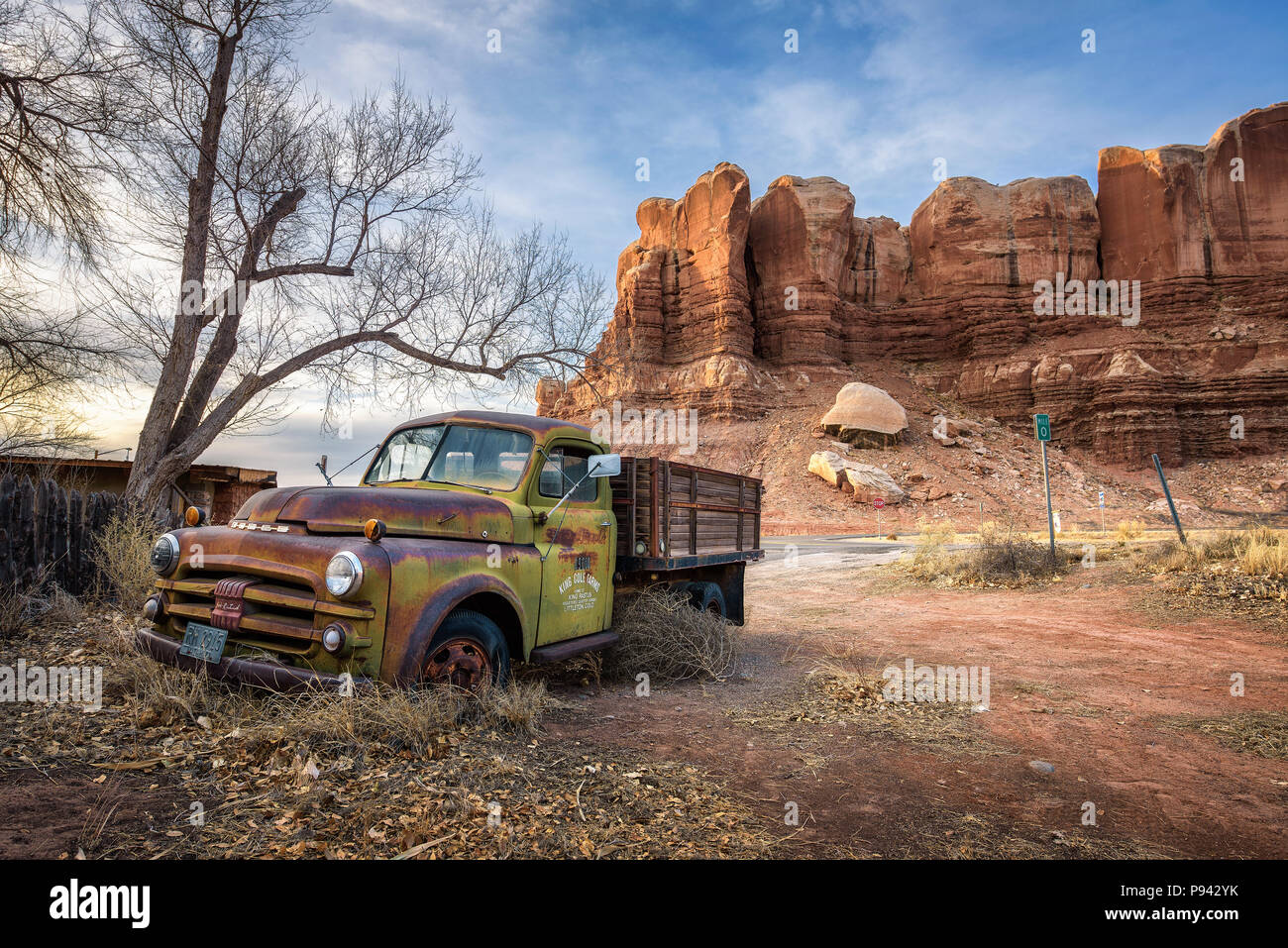 Deserted Dodge pickup vehicle parked near Twin Rocks trading post in Bluff, Utah Stock Photo