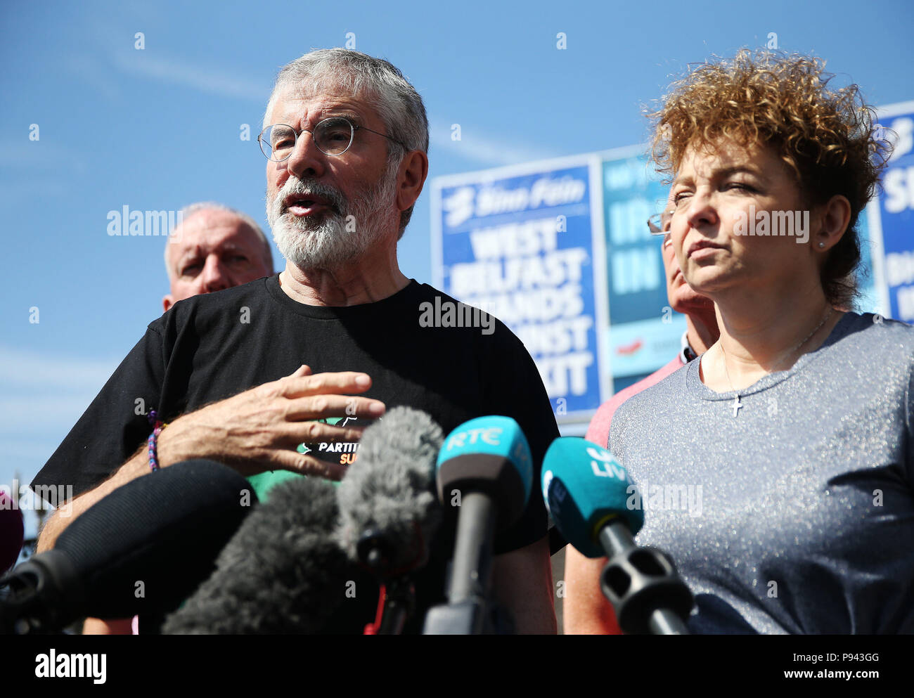 Former Sinn Fein president Gerry Adams at a press conference at Connolly House in Belfast alongside Sinn Fein's Caral Ni Chuilin following an explosives device attack on his and Bobby Storey's homes. Stock Photo