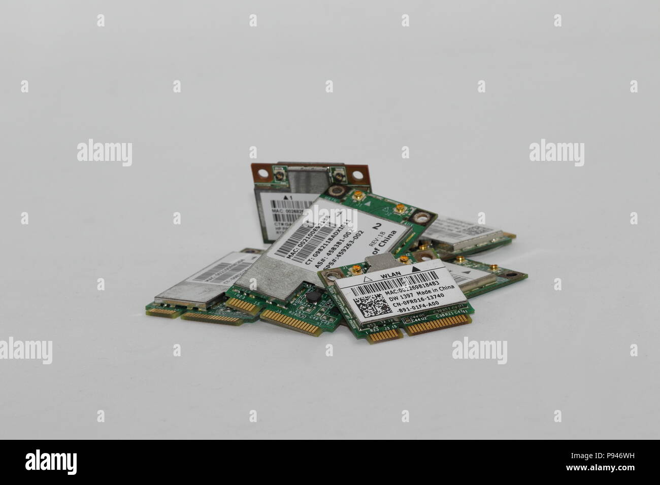 pile of notebook wireless Mini PCI Express Card isolated on white background Stock Photo
