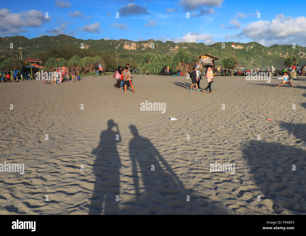 Parangtritis beach is the best tourist place in yogyakarta for enjoying the sunset while having fun. Stock Photo