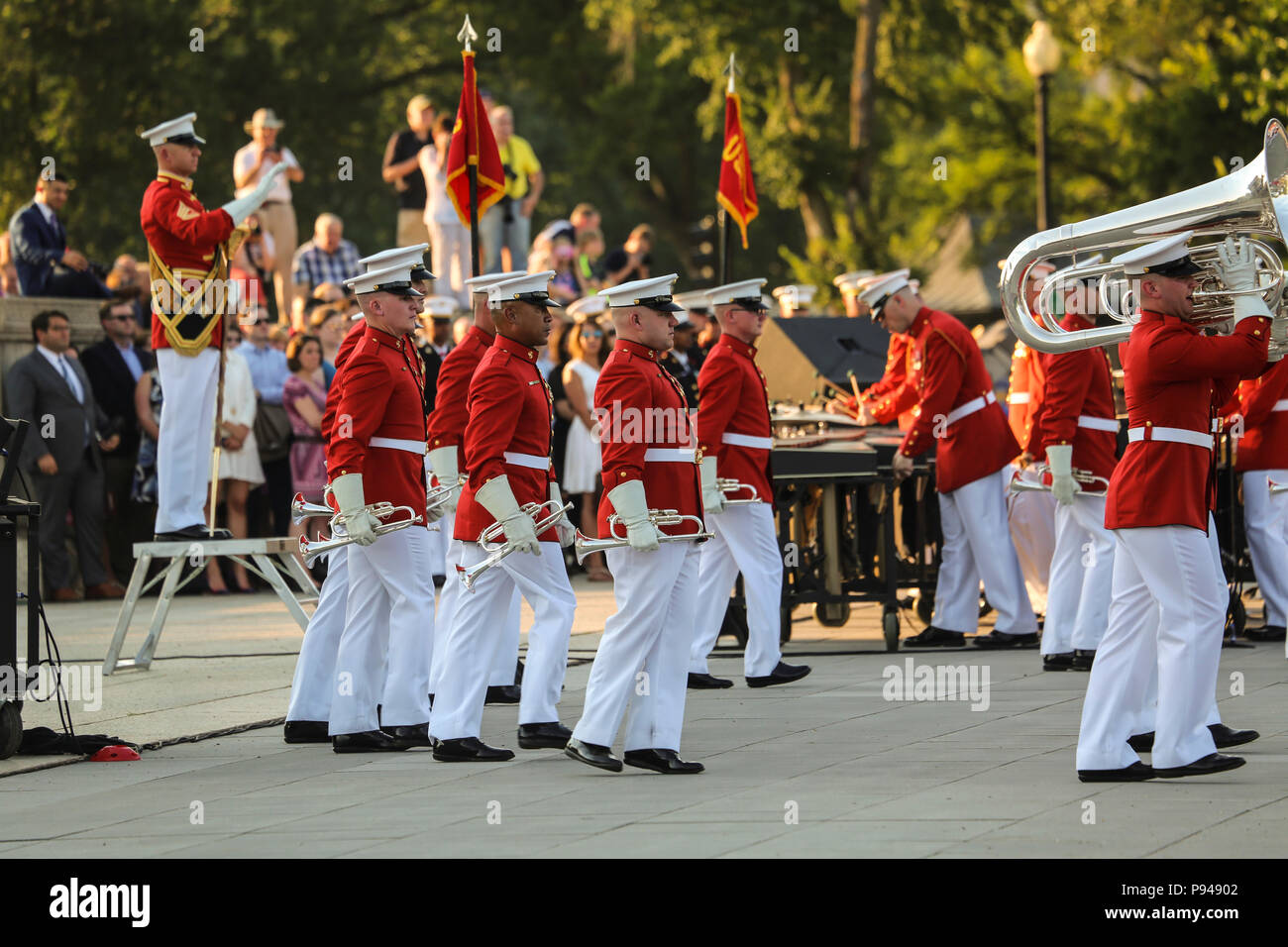 Marines with “The Commandant’s Own,” U.S. Marine Drum & Bugle Corps conduct their “music in motion” sequence during a Tuesday Sunset Parade at the Lincoln Memorial, Washington D.C., July 10, 2018. The guest of honor for the parade was the former Vice President of the U.S., Joe Biden, and the hosting official was the Staff Judge Advocate to the Commandant of the Marine Corps, Maj. Gen. John R. Ewers Jr. (Official Marine Corps photo by Cpl. Damon Mclean/Released) Stock Photo
