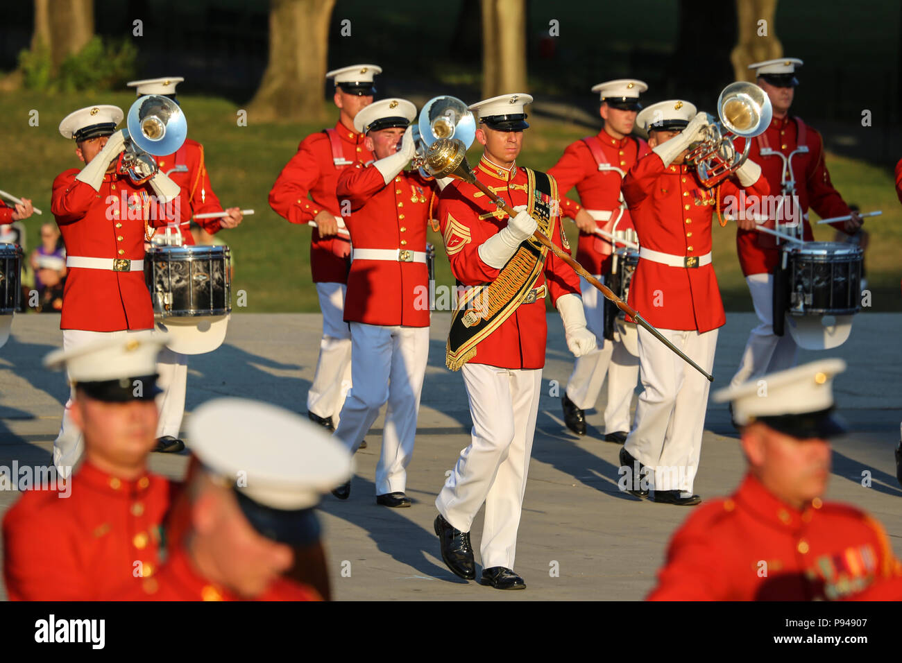 Marines with “The Commandant’s Own,” U.S. Marine Drum & Bugle Corps play a musical ballad during a Tuesday Sunset Parade at the Lincoln Memorial, Washington D.C., July 10, 2018. The guest of honor for the parade was the former Vice President of the U.S., Joe Biden, and the hosting official was the Staff Judge Advocate to the Commandant of the Marine Corps, Maj. Gen. John R. Ewers Jr. (Official Marine Corps photo by Cpl. Damon Mclean/Released) Stock Photo