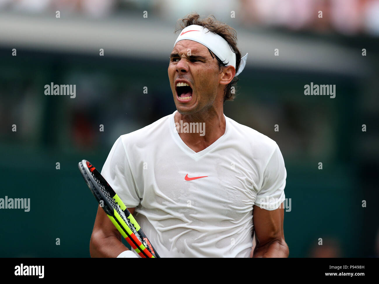 Rafael Nadal celebrates on day twelve of the Wimbledon Championships at the All England Lawn Tennis and Croquet Club, Wimbledon. Stock Photo
