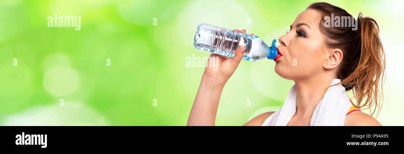 https://c8.alamy.com/comp/P94A95/healthy-and-fitness-lifestyle-banner-attractive-young-woman-drinking-water-during-workout-on-a-fresh-abstract-background-copy-space-P94A95.jpg