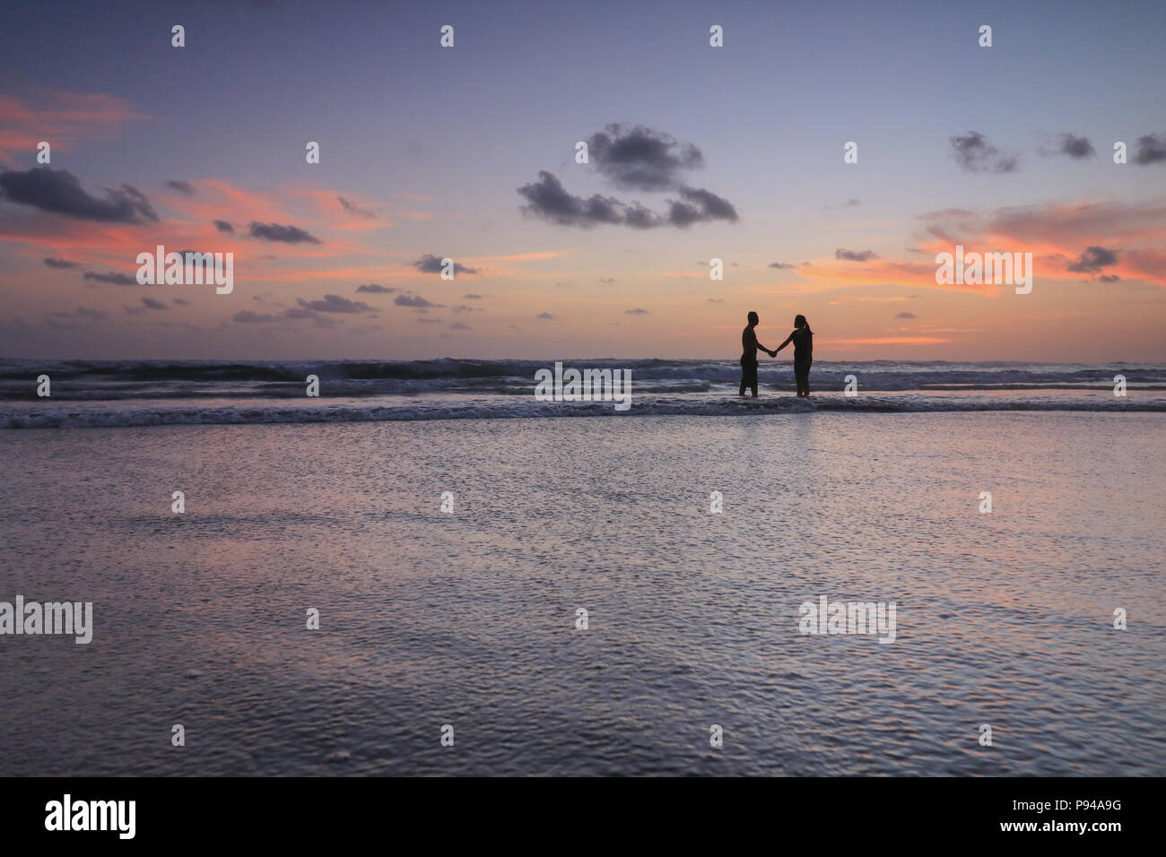 Parangtritis beach is the best tourist place in yogyakarta for enjoying the sunset while having fun. Stock Photo