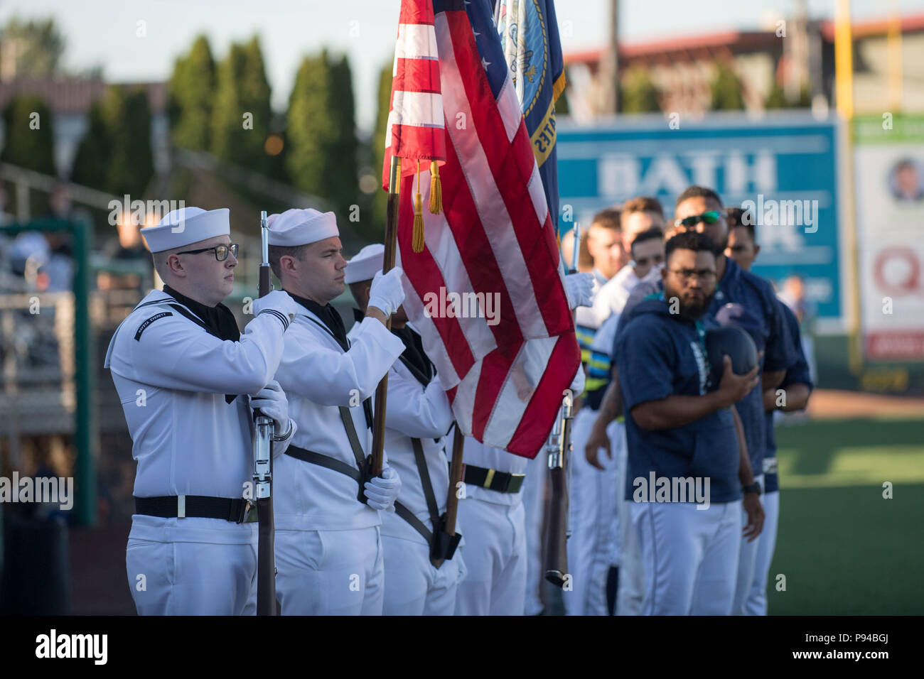 180712-N-DA737-0044 Everett, Wash. (July 12, 2018) Naval Station Everett's honor guard present the colors during the National Anthem at an Everett Aquasox game during Military Appreciation Night. The Aquasox are a Minor League Baseball team of the Northwest league and an affiliate of the Seattle Mariners. NSE's mission is to provide a secure platform for Navy and Coast Guard forces, important mission capabilities, and quality of life for service members and their families. (U.S. Navy photo by Mass Communication Specialist 2nd Class Jonathan Jiang/Released) Stock Photo