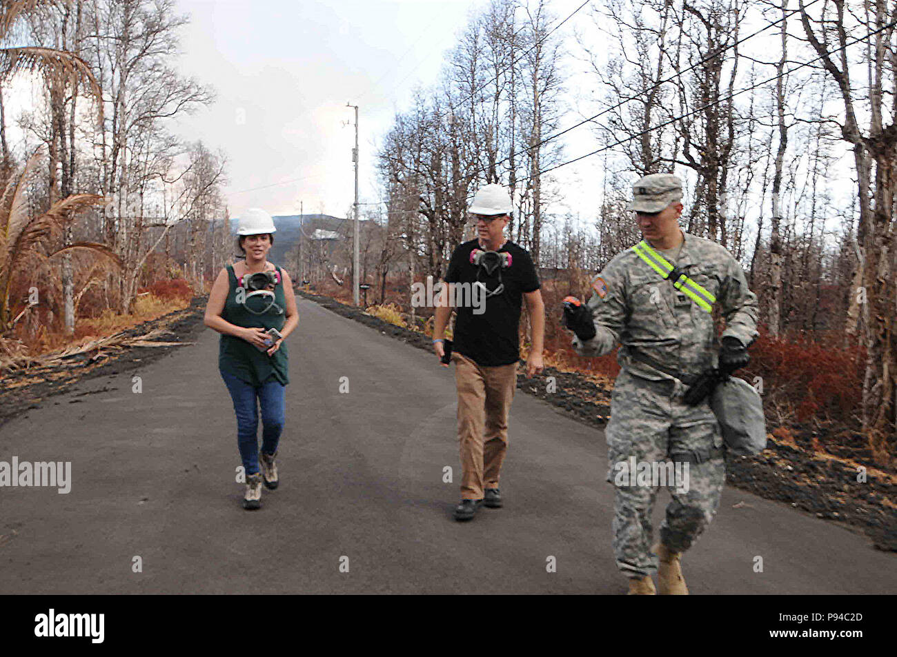 Capt. Darren Taylor, Task Force Hawaii Public Affairs Officer, surveys ...