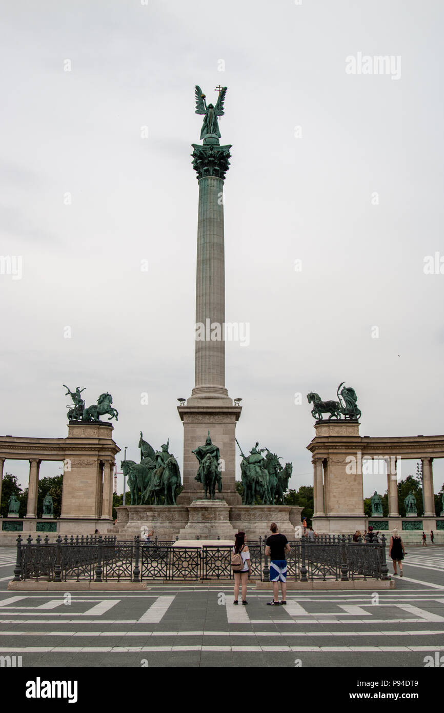 A central view of the Millennium Monument in Heroes Square, Budapest, showing the column of